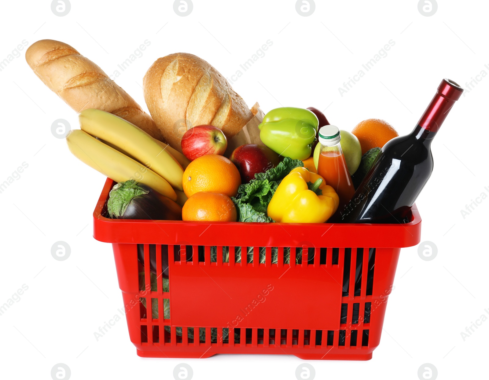 Photo of Shopping basket with grocery products on white background