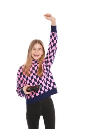 Photo of Teenage girl playing video games with controller isolated on white