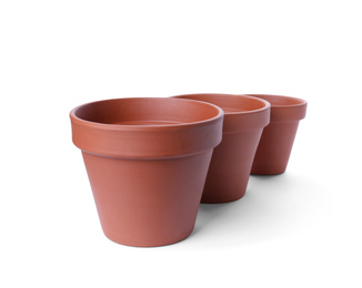 Stylish terracotta flower pots isolated on white