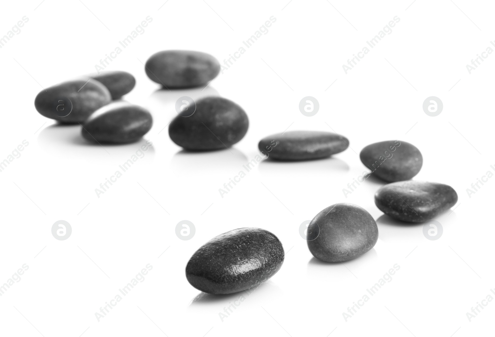 Photo of Composition with spa stones on white background