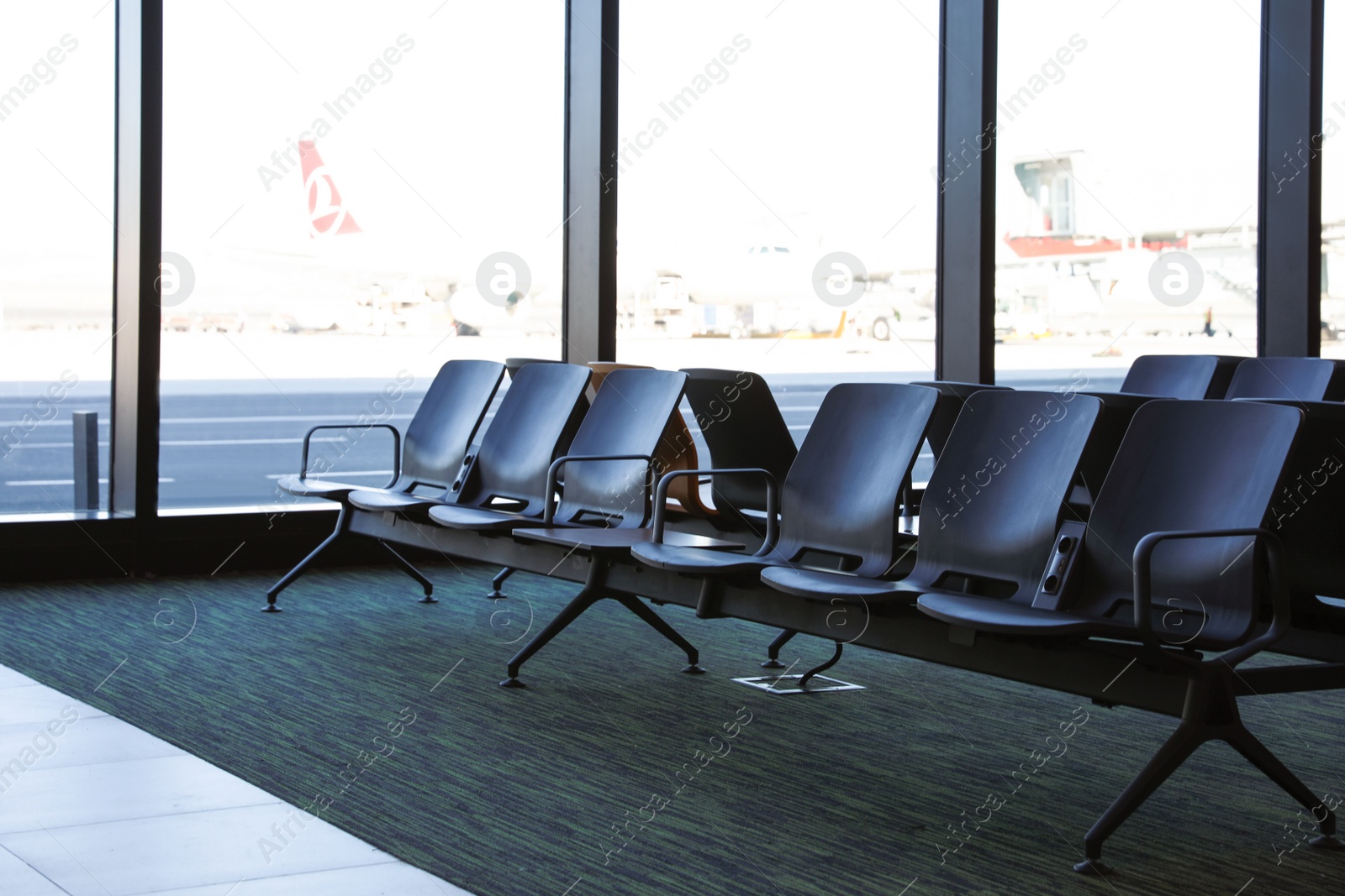 Photo of ISTANBUL, TURKEY - AUGUST 13, 2019: Waiting area with seats in new airport terminal