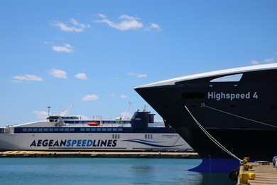 Photo of PIRAEUS, GREECE - MAY 19, 2022: Picturesque view of port with Speedrunner III vessel on sunny day