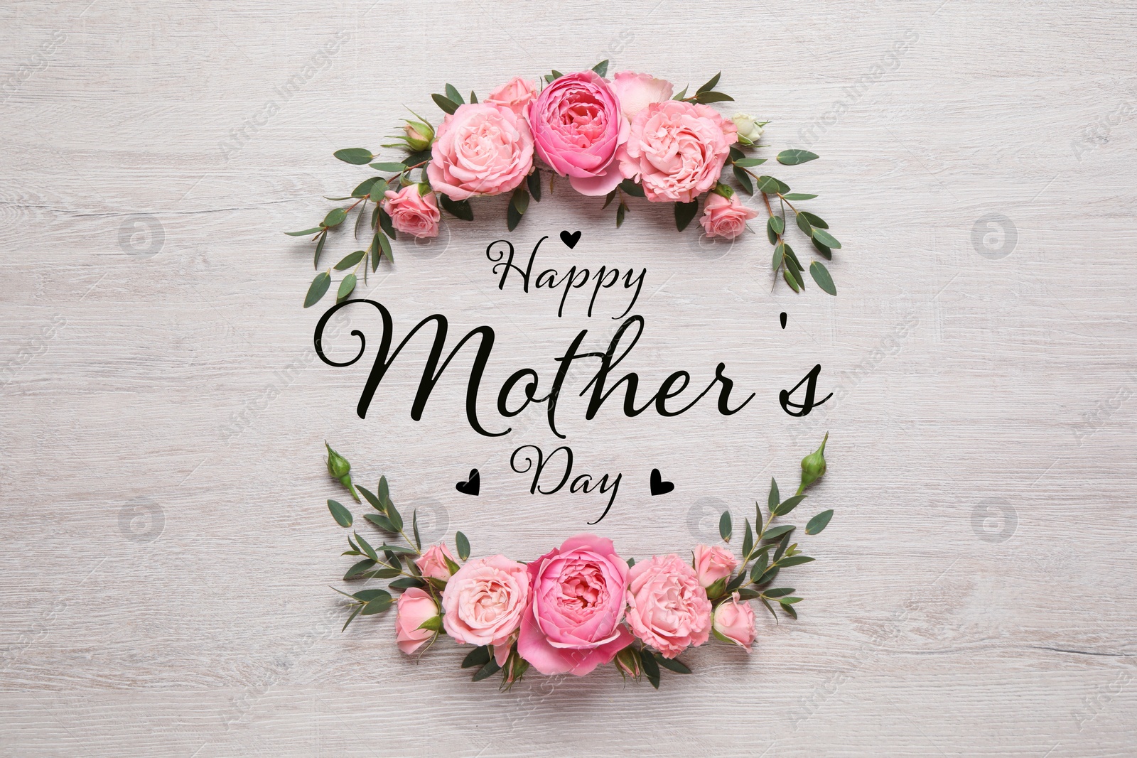 Image of Happy Mother's Day. Greeting card with frame of beautiful flowers on white wooden background, flat lay