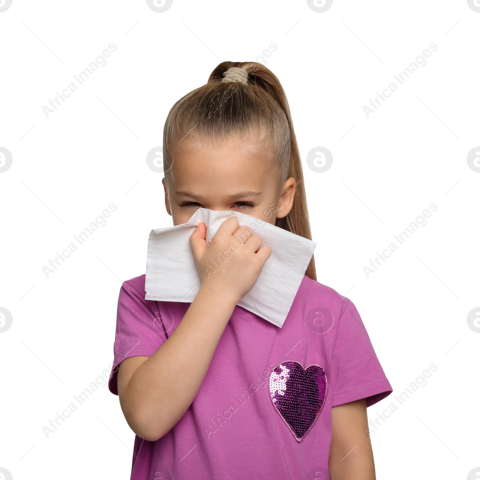 Photo of Sick girl blowing nose in tissue on white background. Cold symptoms