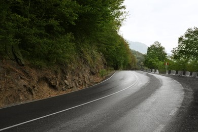 Photo of Beautiful view on empty asphalt road in mountains