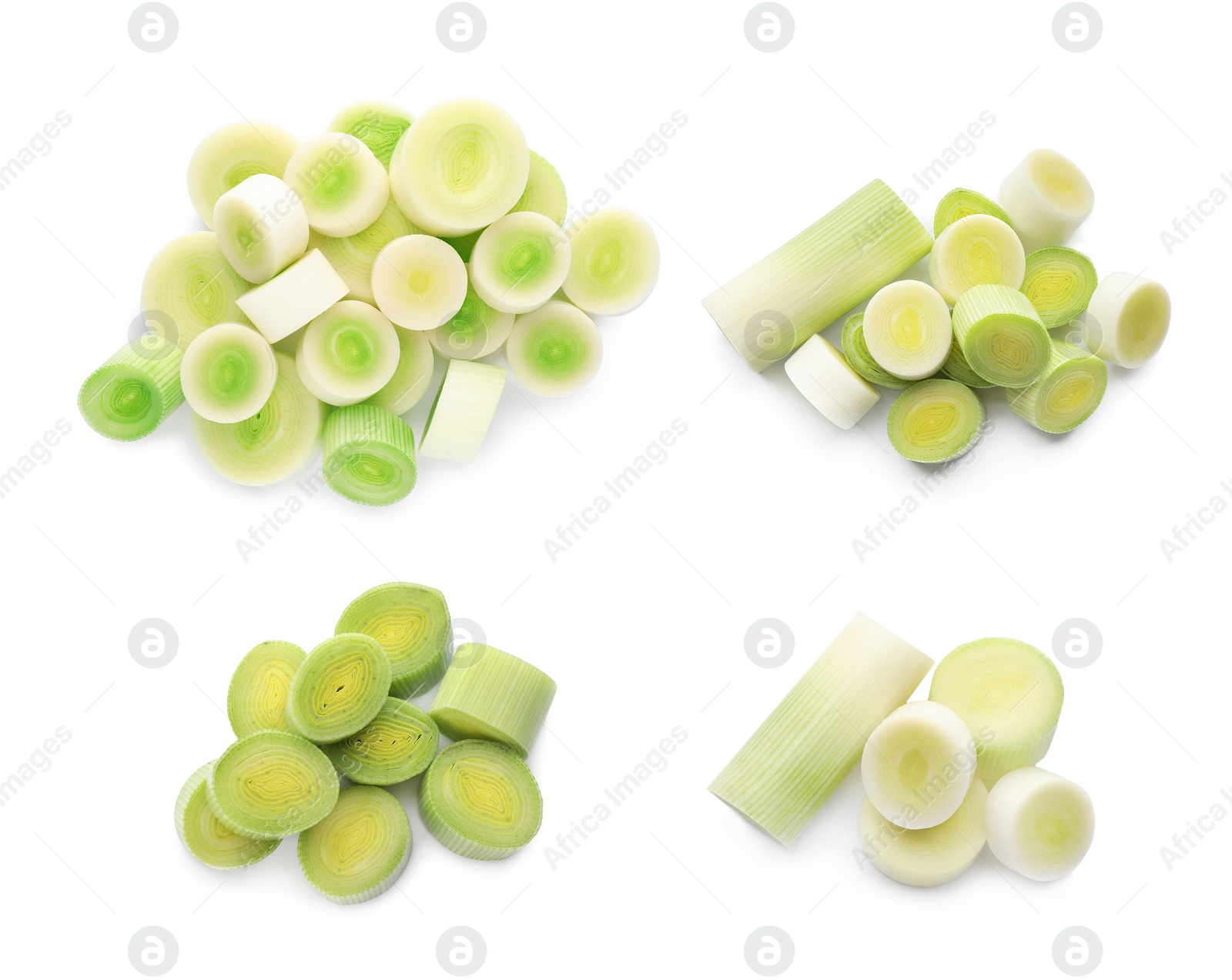 Image of Set with fresh raw cut leeks on white background, top view