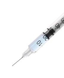 Disposable syringe with needle and medicine isolated on white