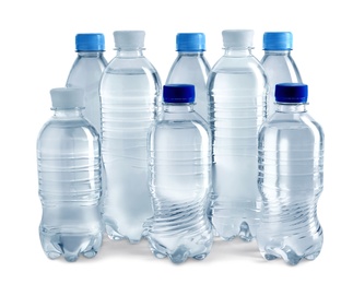 Photo of Set of different plastic bottles with water on white background