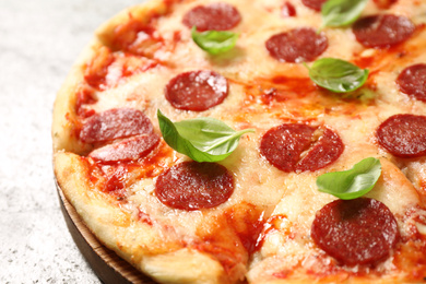 Hot delicious pepperoni pizza on table, closeup