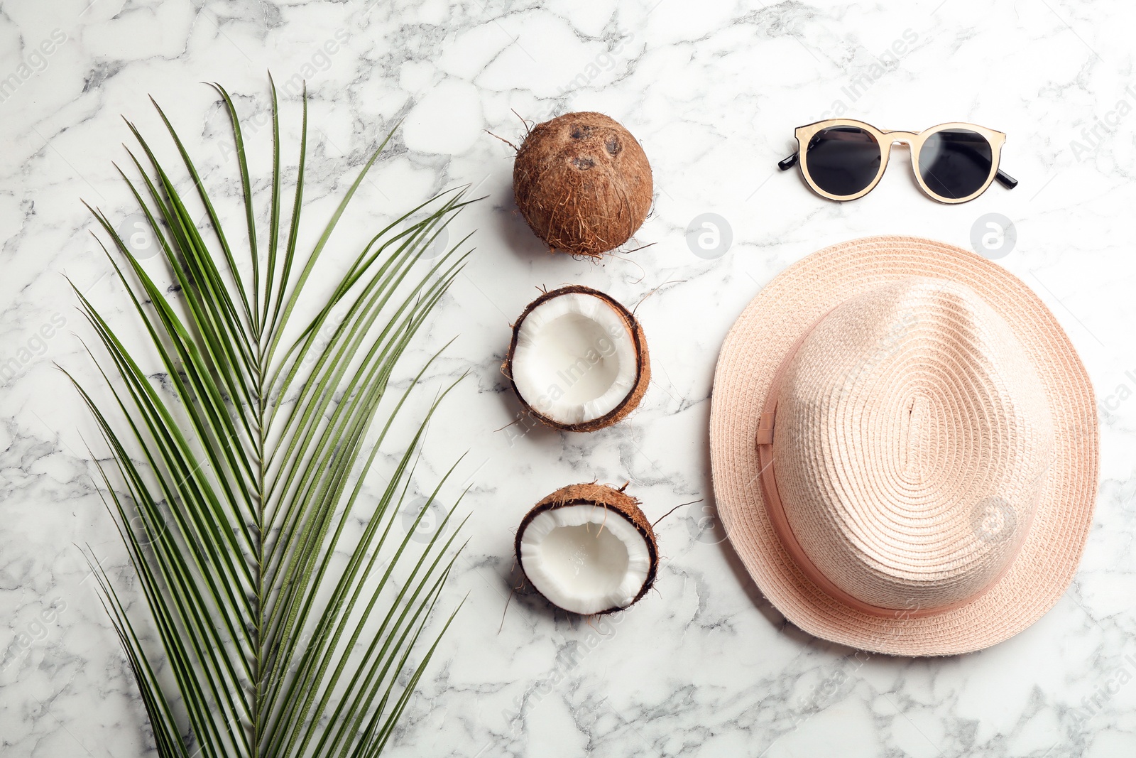 Photo of Flat lay composition with coconuts on marble background