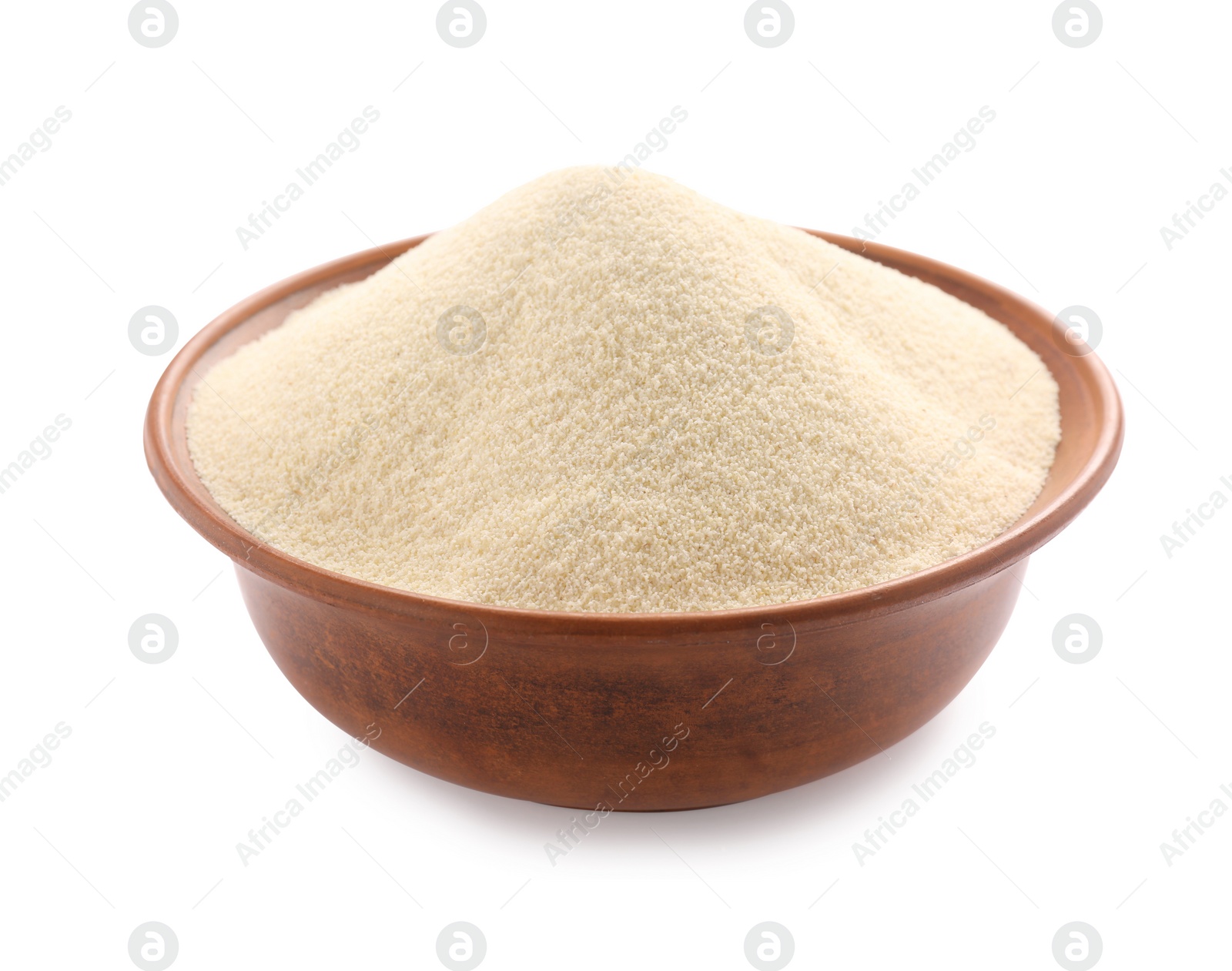 Photo of Bowl of uncooked organic semolina isolated on white