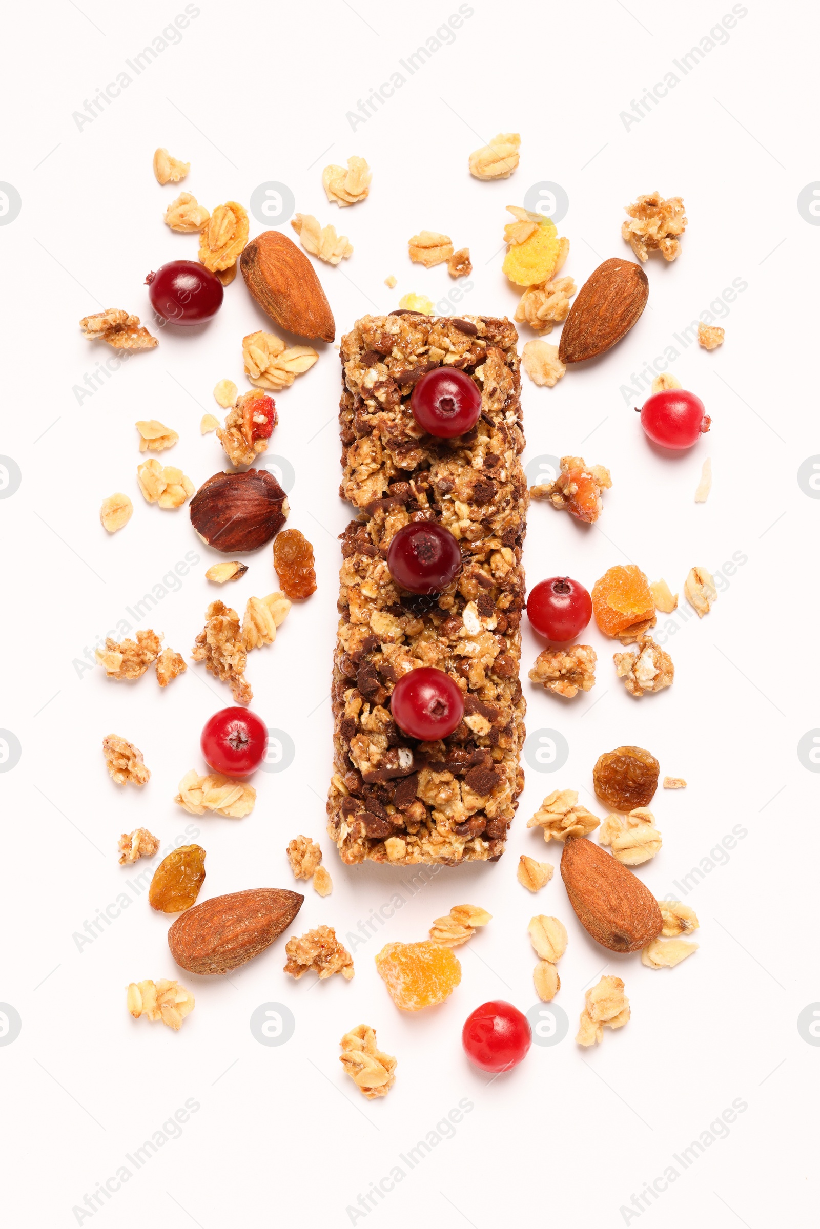 Photo of Tasty granola bar and ingredients isolated on white, top view