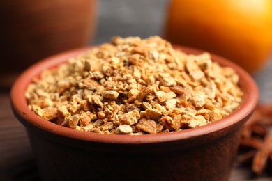 Photo of Bowl of dried orange zest seasoning, closeup