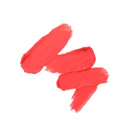 Photo of Swatches of lipstick isolated on white, top view