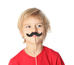 Little boy with fake mustache on white background. April fool's day