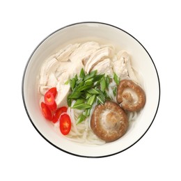 Photo of Delicious ramen with meat and mushrooms in bowl isolated on white, top view. Noodle soup