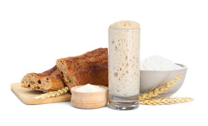 Freshly baked bread, sourdough, flour and spikes on white background