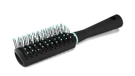 Photo of New modern hair brush isolated on white