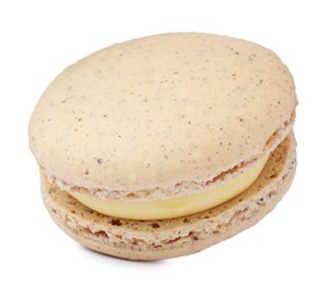 Photo of Beige macaron isolated on white. Delicious dessert