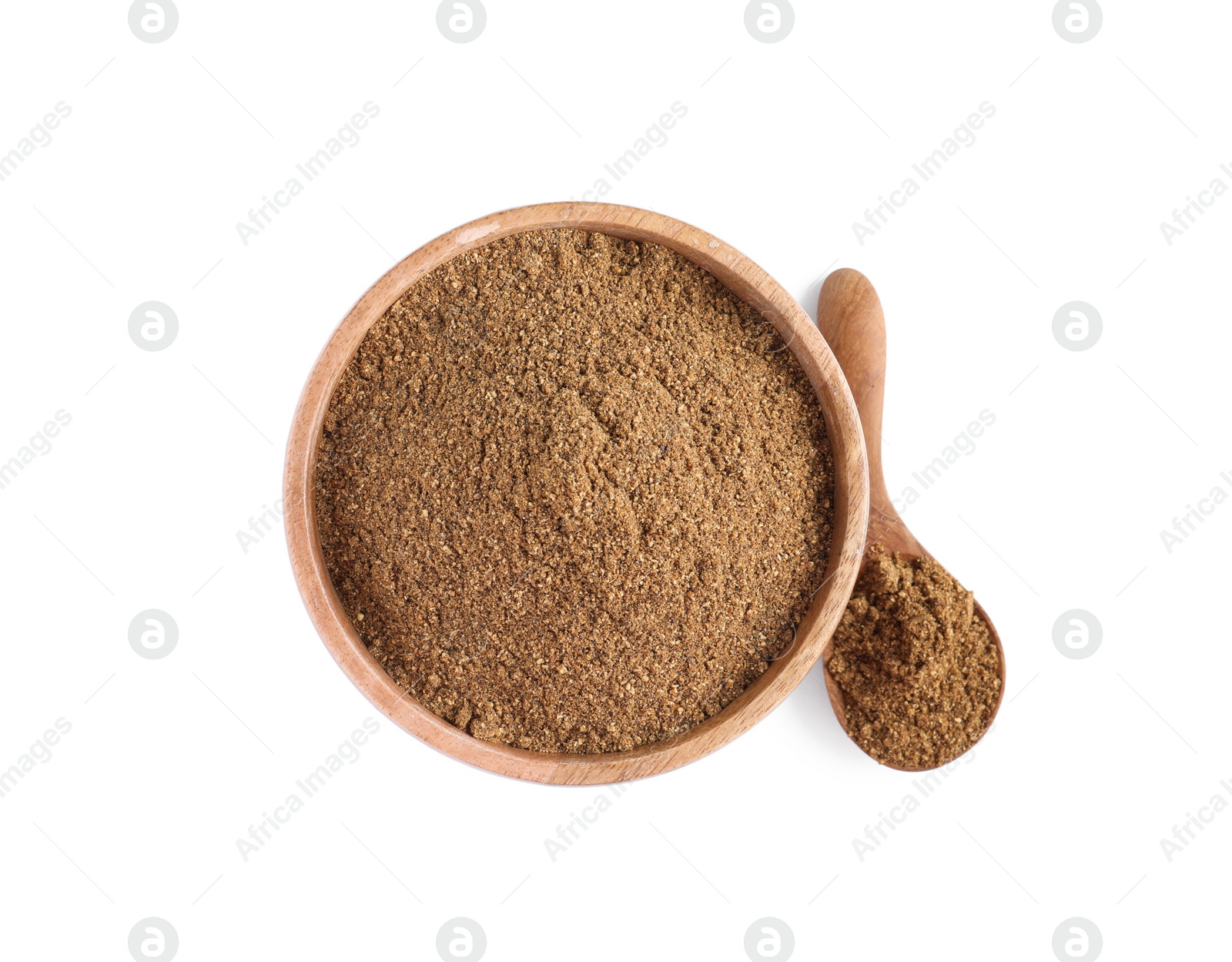Photo of Bowl and spoon of aromatic caraway (Persian cumin) powder isolated on white, top view