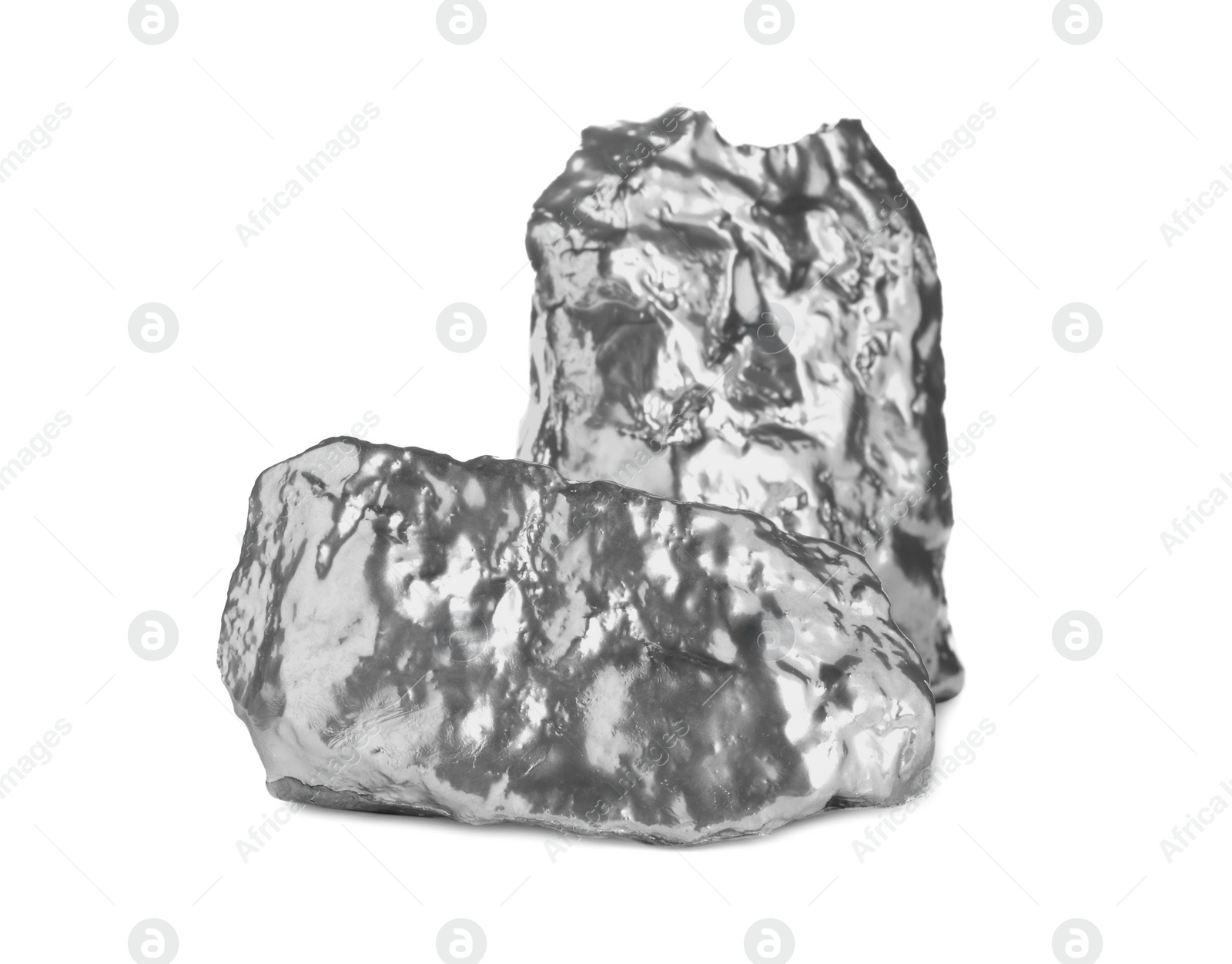 Photo of Two shiny silver nuggets on white background