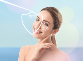 Image of SPF shield and beautiful young woman with healthy skin on blurred background. Sun protection cosmetic product