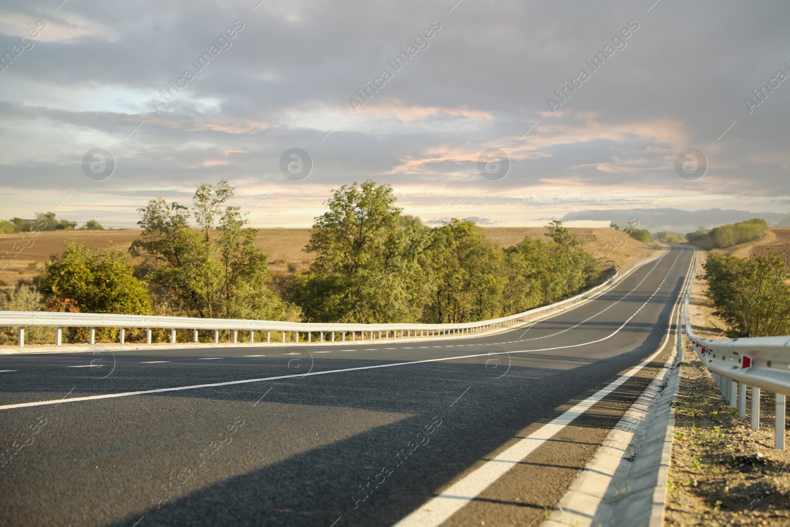 Photo of Beautiful view of empty asphalt highway. Road trip