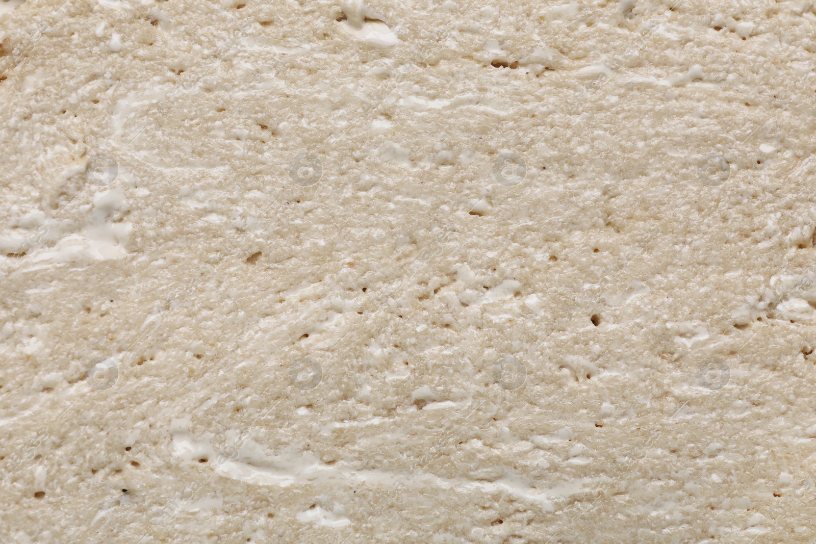 Photo of Texture of delicious halva as background, closeup