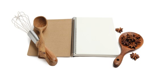 Photo of Blank recipe book, anise stars and kitchen utensils on white background. Space for text