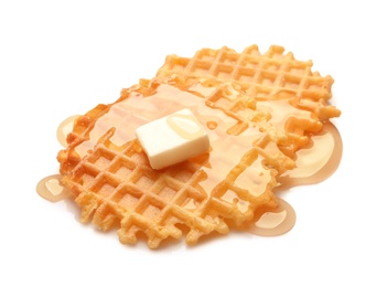 Photo of Delicious waffles with butter and honey on white background