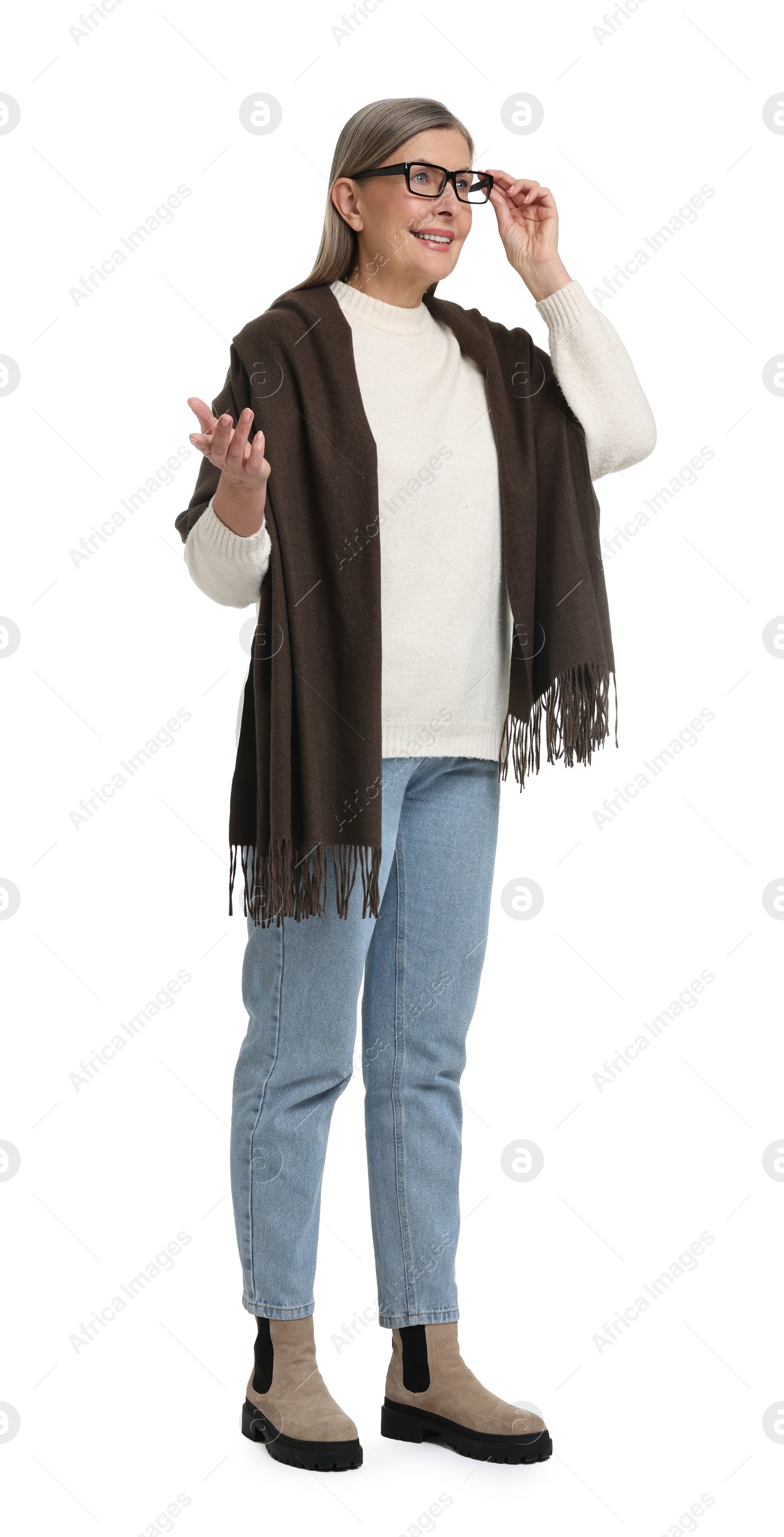 Photo of Full length portrait of senior woman on white background