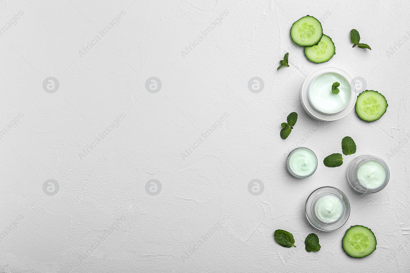 Photo of Composition with body cream on light background