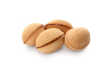 Photo of Delicious nut shaped cookies with boiled condensed milk on white background