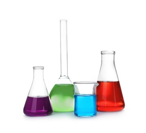 Laboratory glassware with color liquids on white background