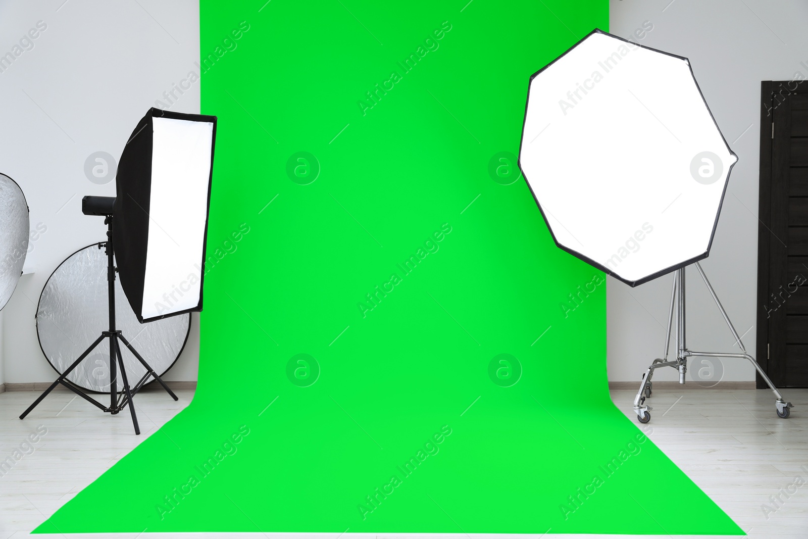 Image of Chroma key compositing. Green backdrop and equipment in studio