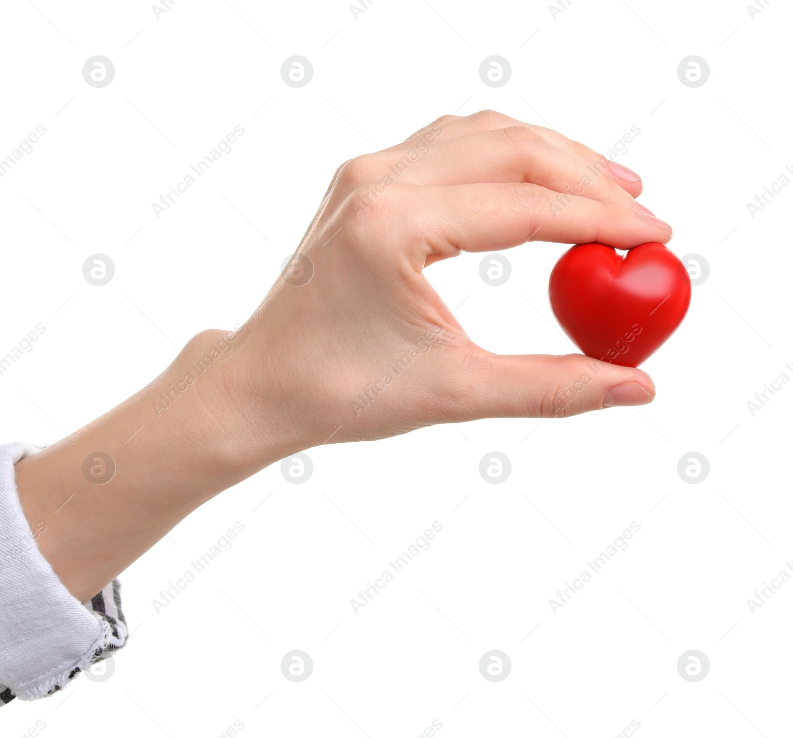 Photo of Woman holding small red heart on white background. Heart attack concept