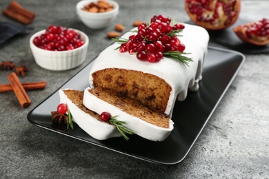 Traditional Christmas cake on grey table. Classic recipe