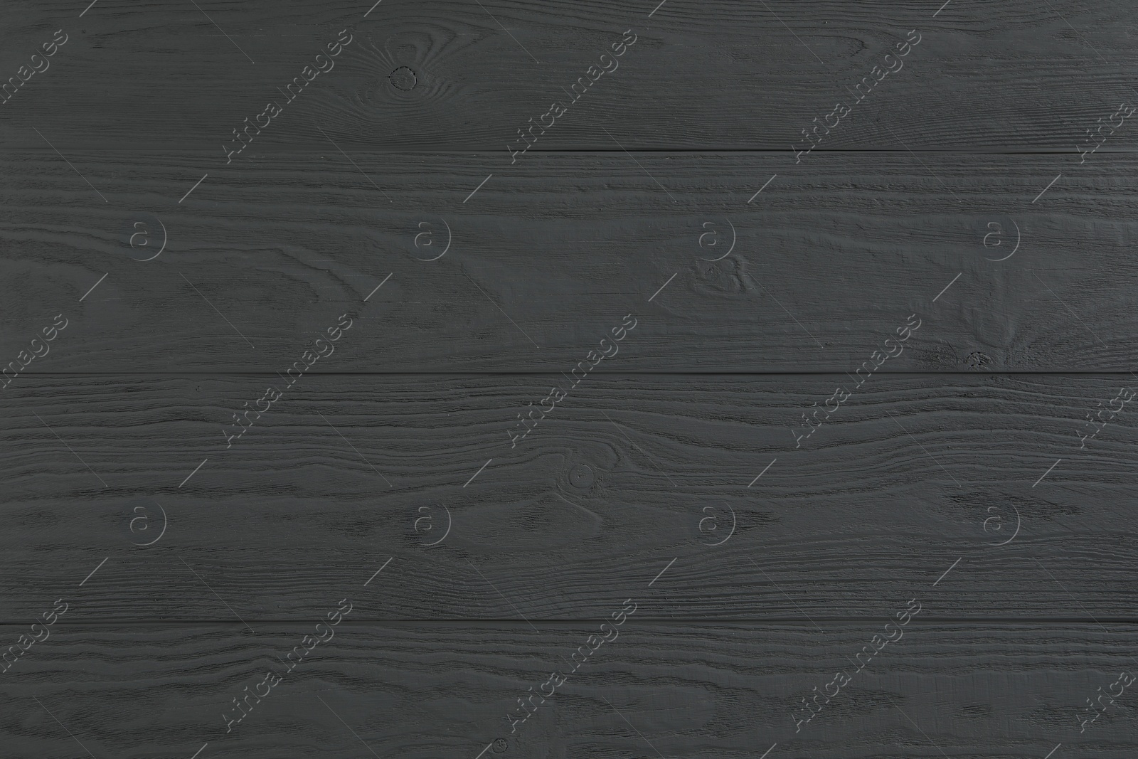 Photo of Texture of grey wooden surface as background, closeup