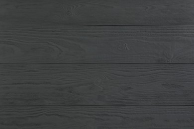 Photo of Texture of grey wooden surface as background, closeup