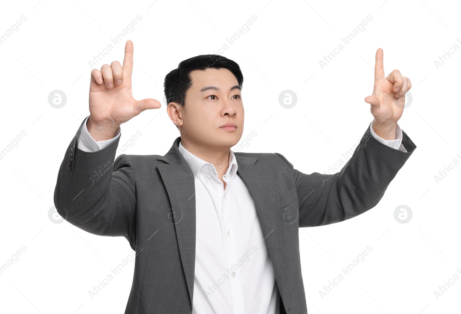 Photo of Businessman in suit posing on white background