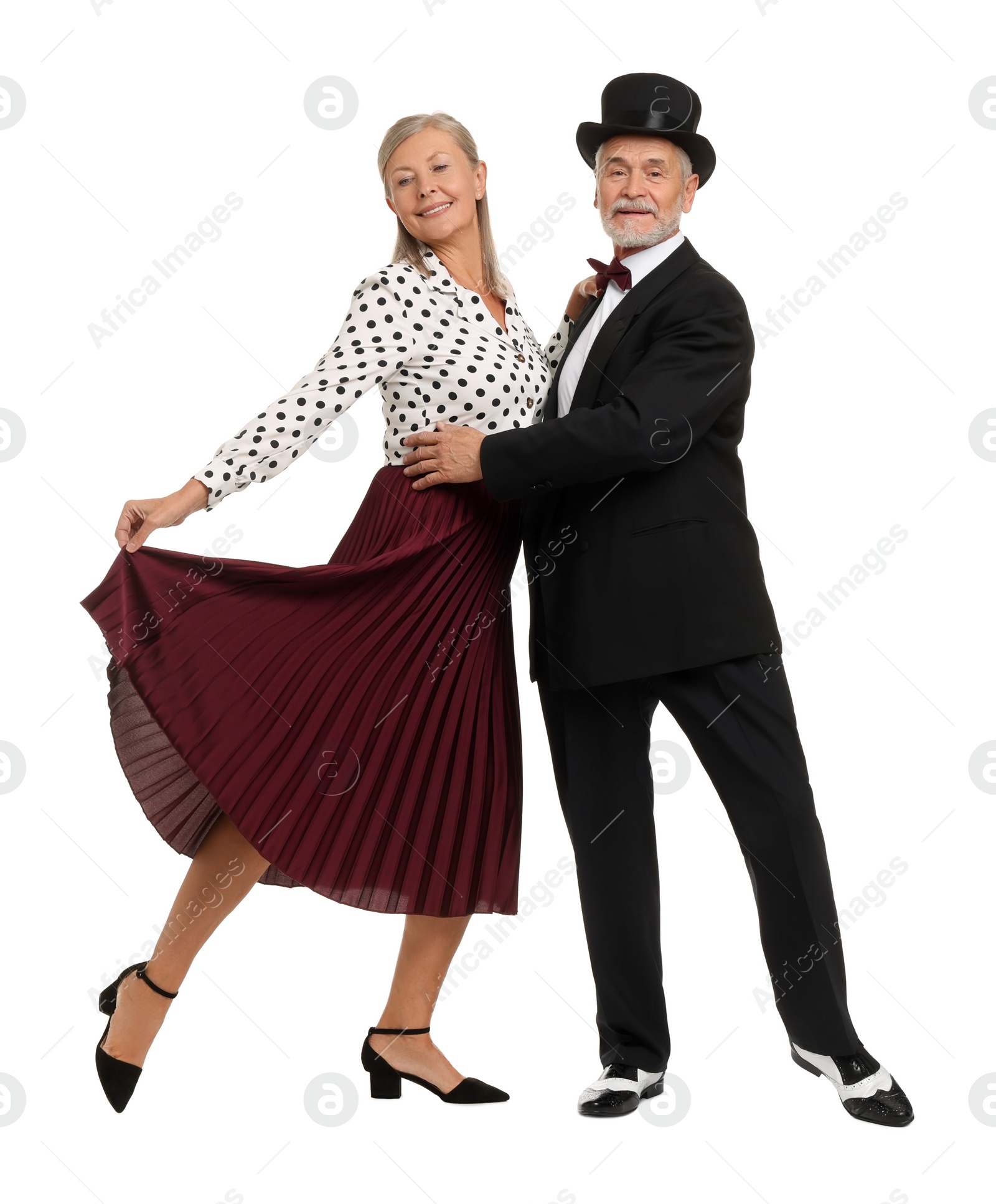 Photo of Senior couple dancing together on white background