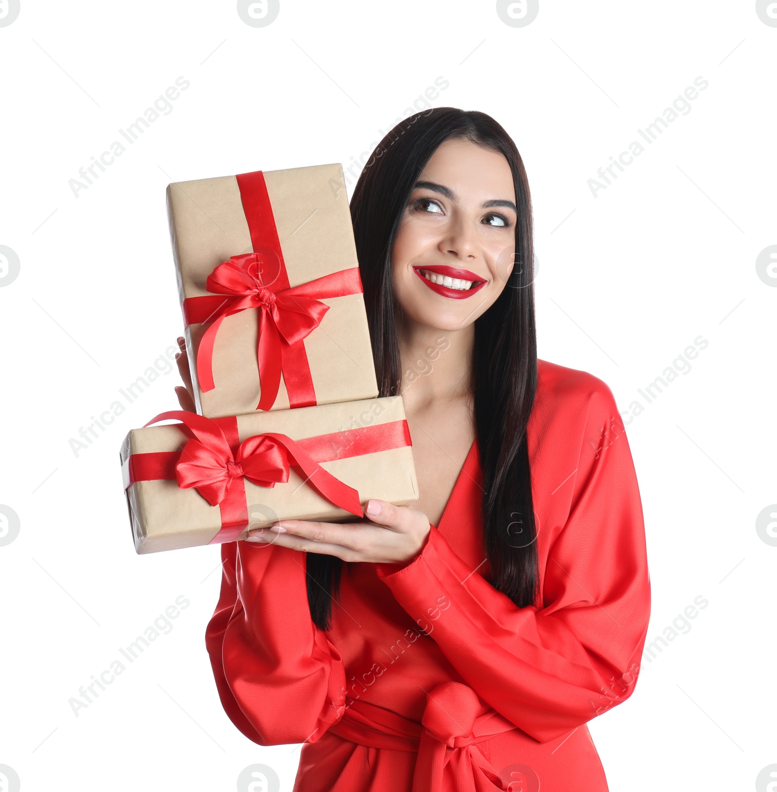 Photo of Woman in red dress holding Christmas gifts on white background