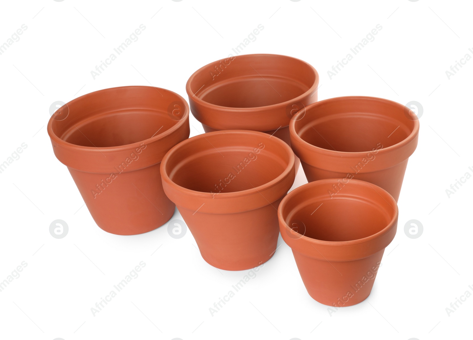 Photo of Empty clay flower pots isolated on white