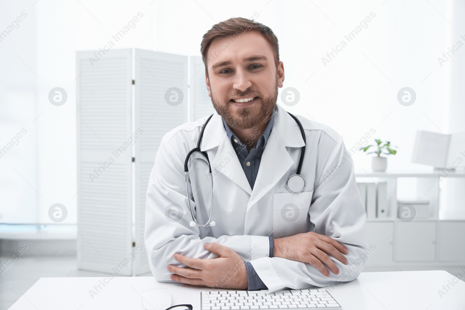 Photo of Pediatrician consulting patient using video chat in clinic, view from webcam