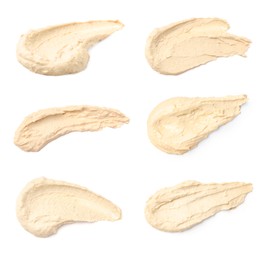 Image of Set with smears of tasty hummus on white background