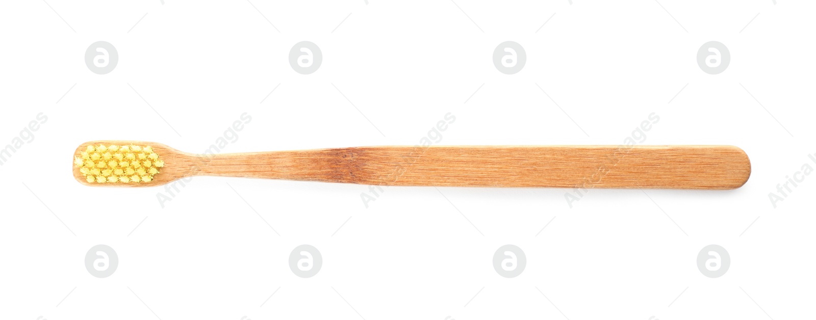 Photo of Toothbrush made of bamboo on white background, top view