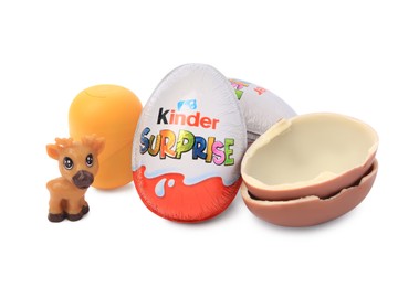 Photo of Slynchev Bryag, Bulgaria - May 24, 2023: Kinder Surprise Eggs, plastic capsule and toy deer isolated on white