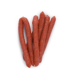 Thin dry smoked sausages isolated on white, top view