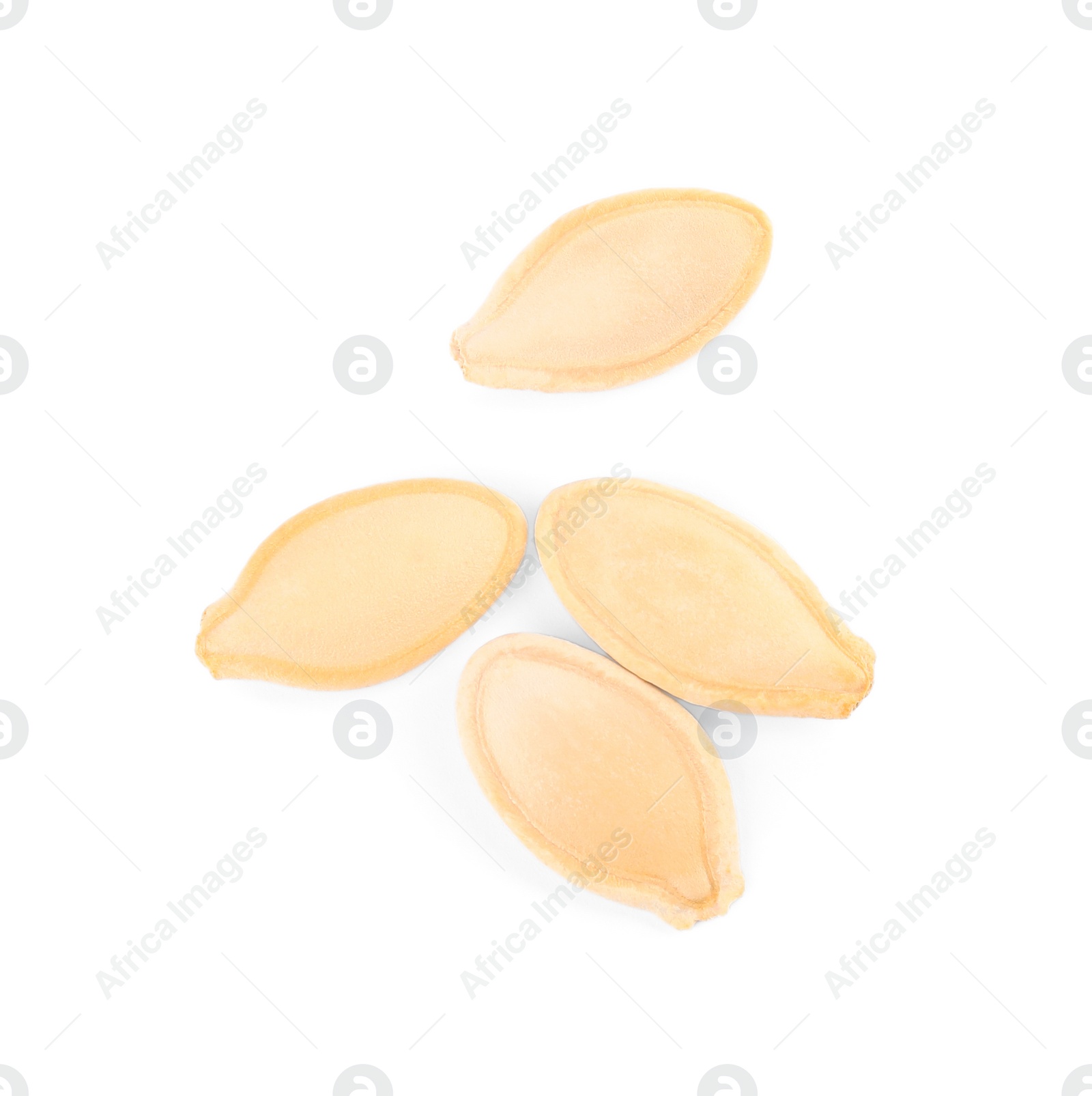 Photo of Raw unpeeled pumpkin seeds on white background, top view