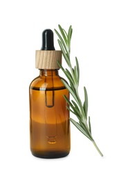 Photo of Bottle of essential oil and fresh rosemary isolated on white